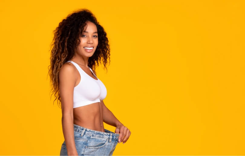 black-woman-wearing-too-large-jeans-showing-slimme-2024-01-04-18-45-23-utc (1) (1)