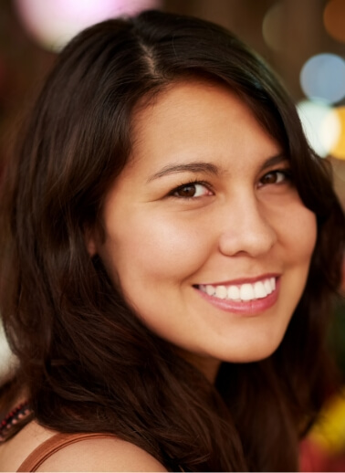 cropped-portrait-of-a-young-female-tourist-standin-2023-11-27-05-32-11-utc (1)