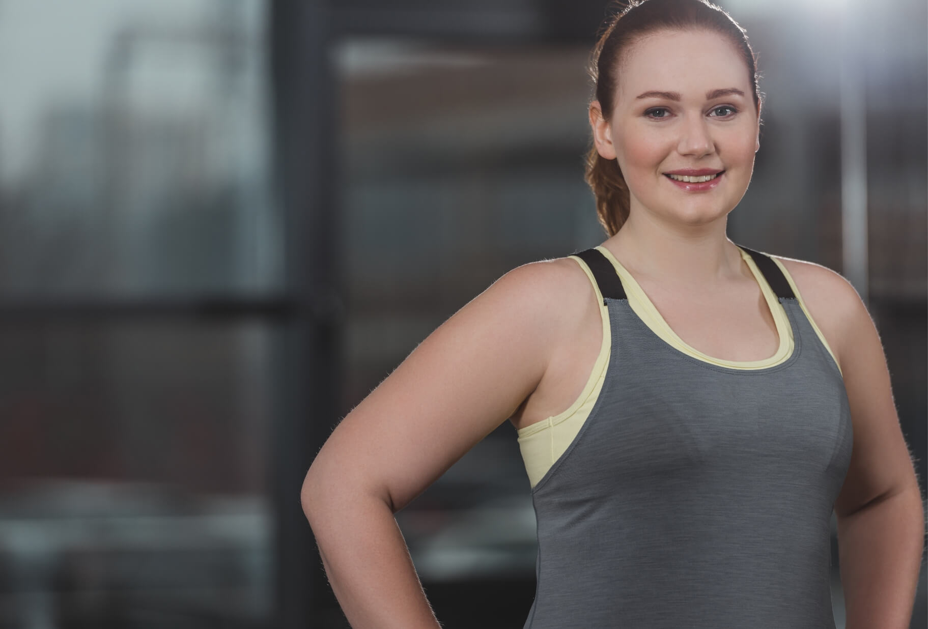 portrait-of-obese-girl-smiling-in-gym-2023-11-27-05-34-35-utc (1)